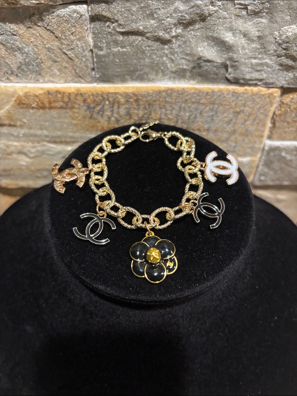 Gold Charm Bracelet with Black CC Flower and CC Logos